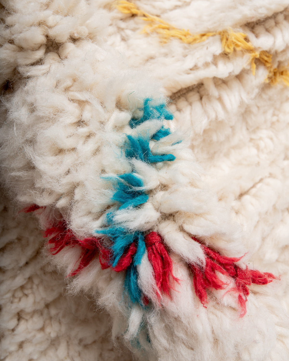 Modern, designer, handcrafted Berber rug from Morocco. Beniourain carpet with beautiful colours and patterns and fluffy wool texture.